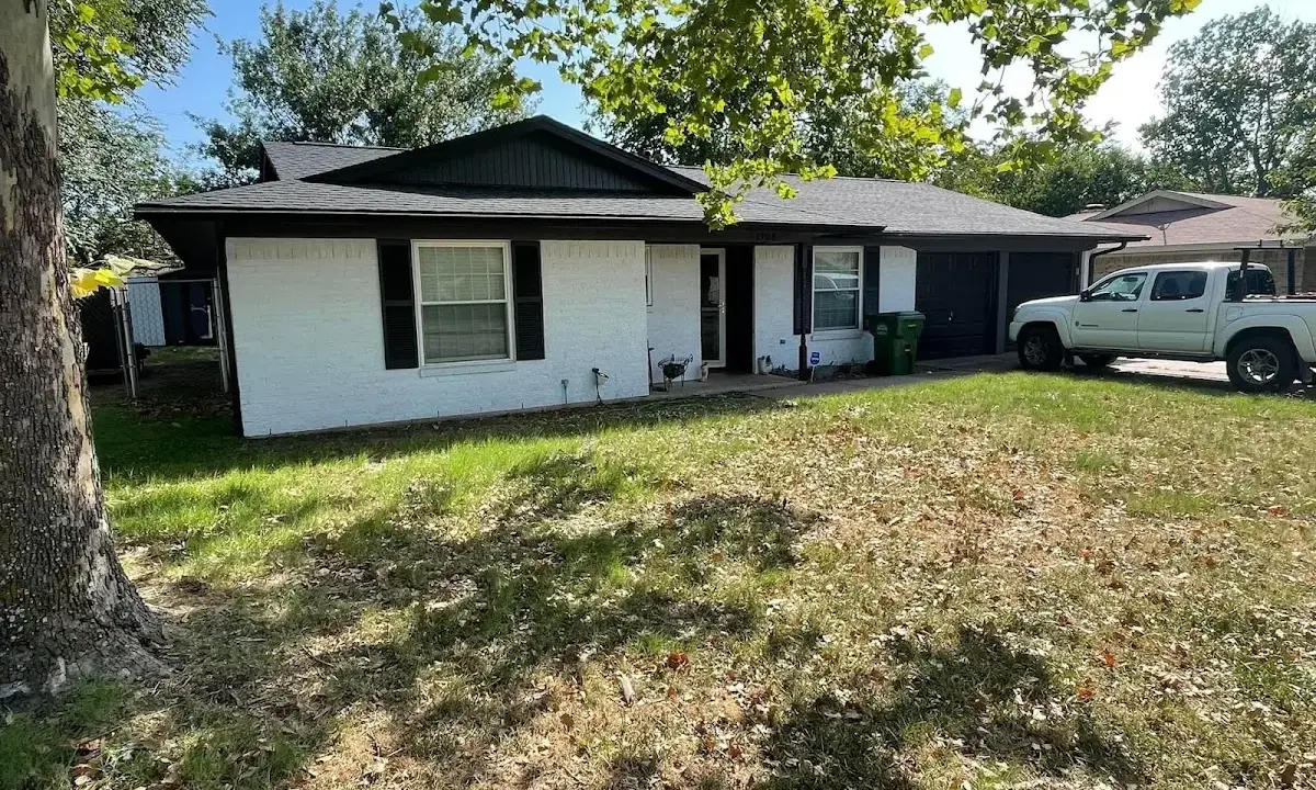 Professional roofing crew working on a residential roof in Palmerton